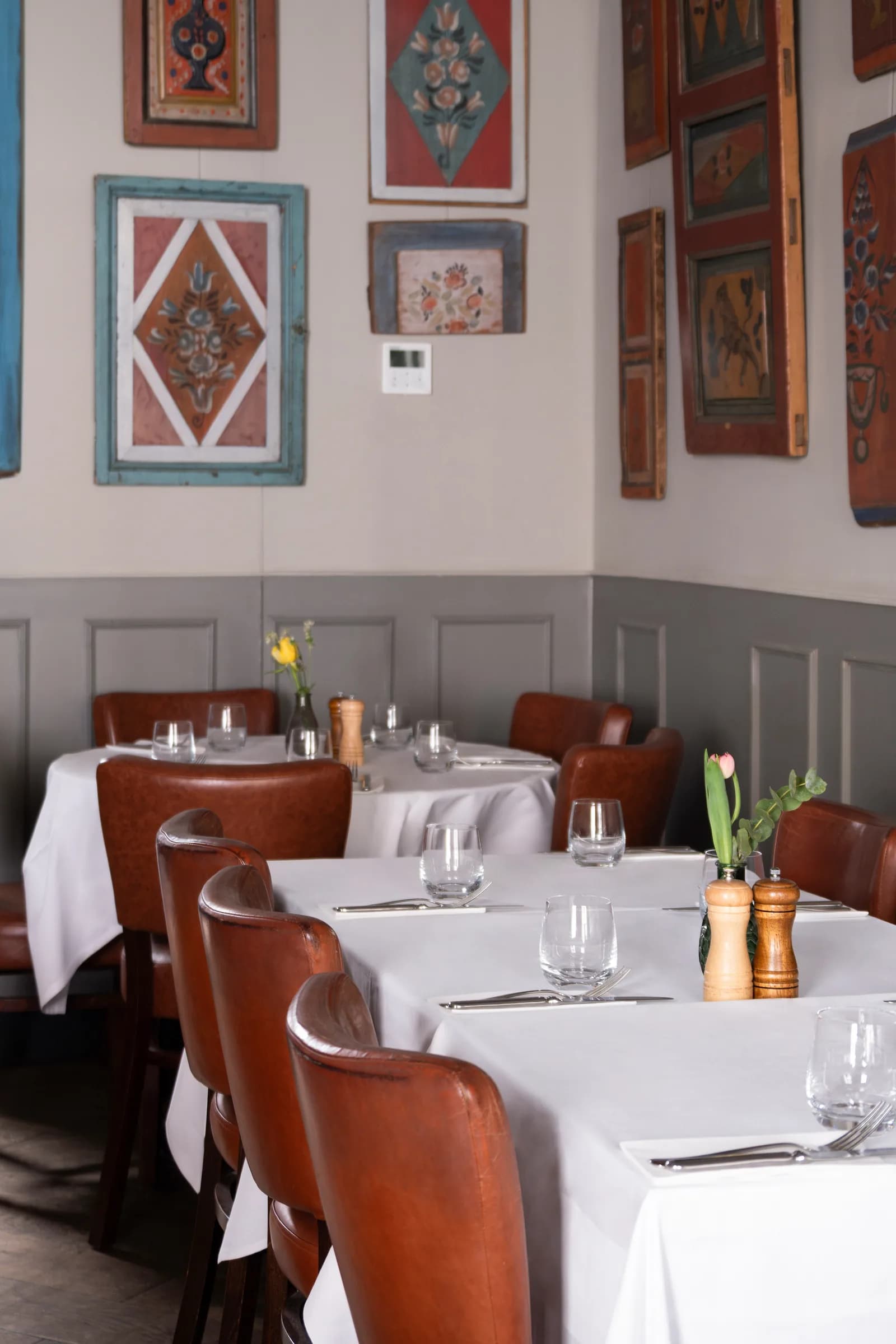 First-floor room at ZIMA laid for dinner
