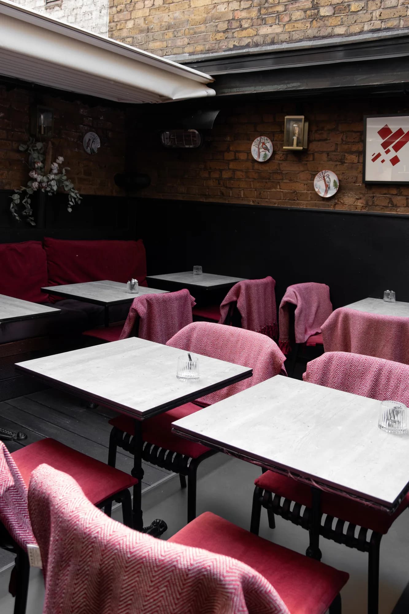 Laika room at ZIMA with velvet seating